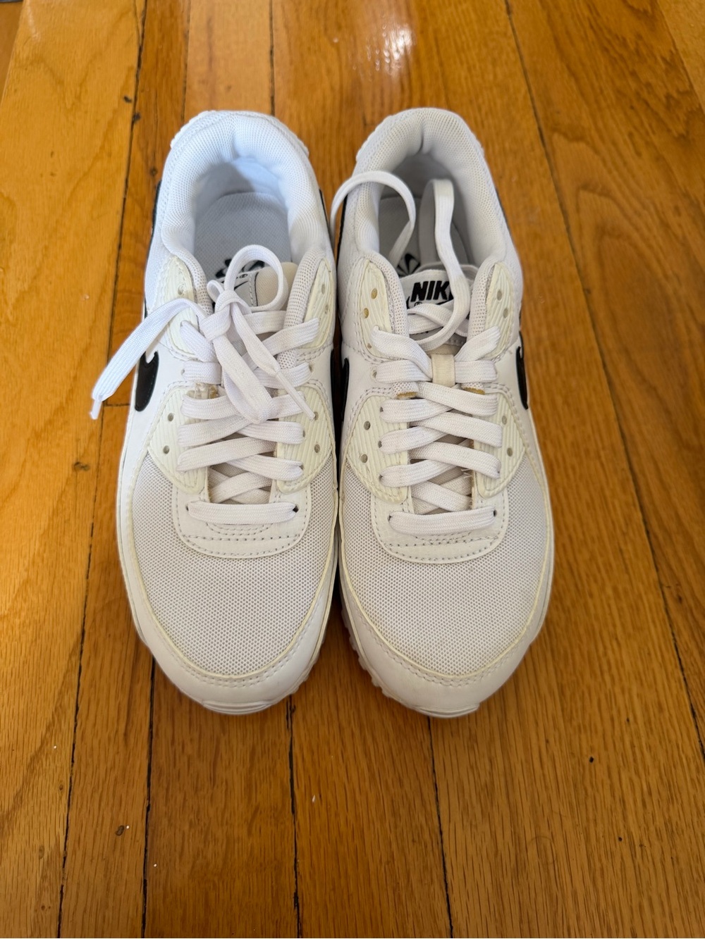 Nike Kids White Sneakers with Black Swoosh